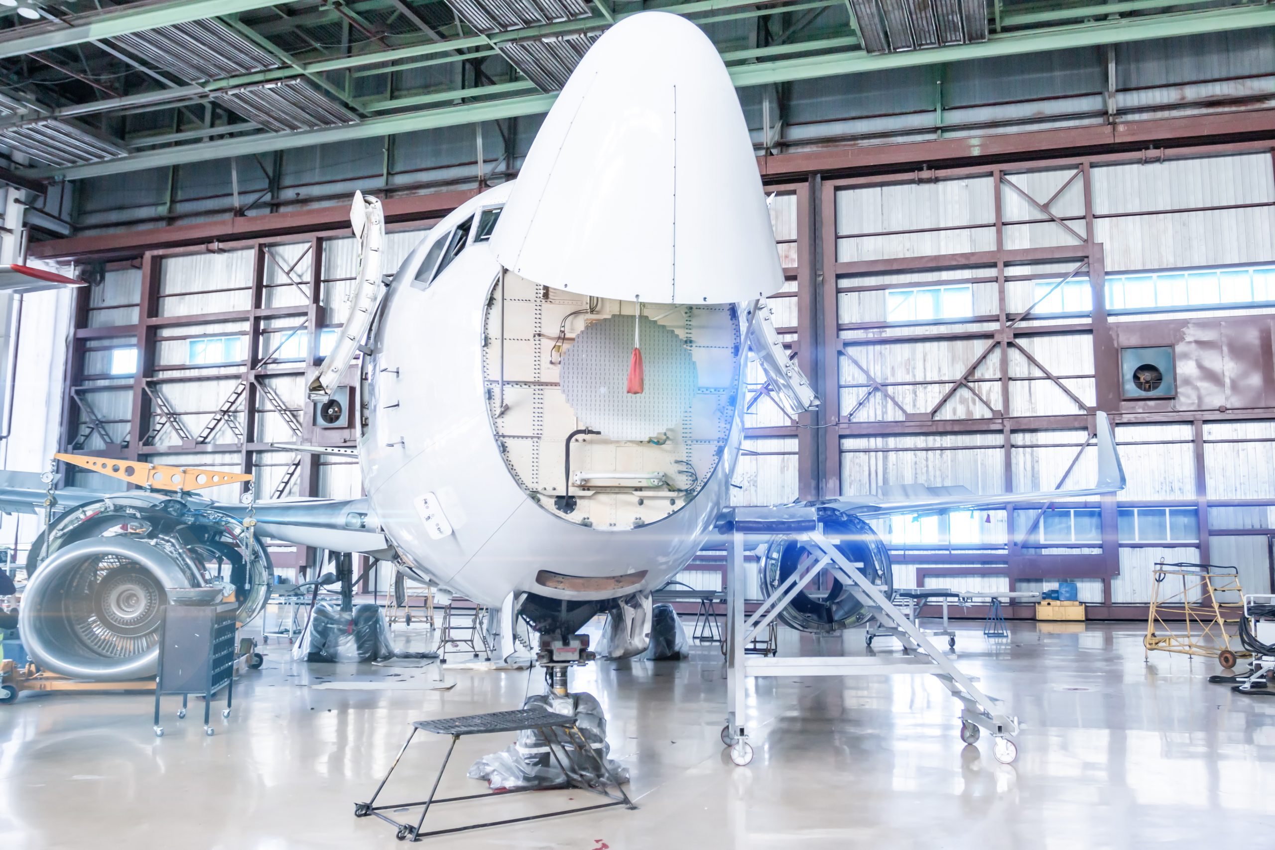 passenger-aircraft-maintenance-checking-mechanical-systems-airplane-flight-operations-front-view