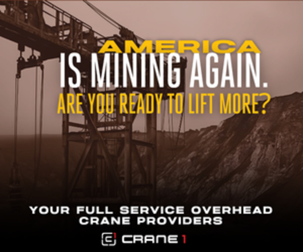 Large mining crane in an industrial setting with text promoting overhead crane system services: "America is mining again. Are you ready to lift more? Your full service overhead crane system providers.